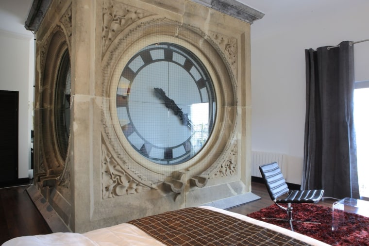 This temporary lodging is built around a city-sized clock in Ghent, Belgium.